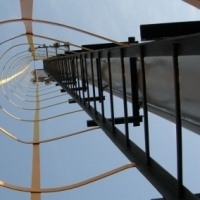 Лестница ТС стальная вертикальная с ограждением для прожекторных мачт ПМЖ