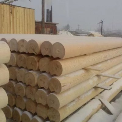 Оцилиндрованное бревно зимней заготовки из Ангарской сосны и Сибирской лиственницы