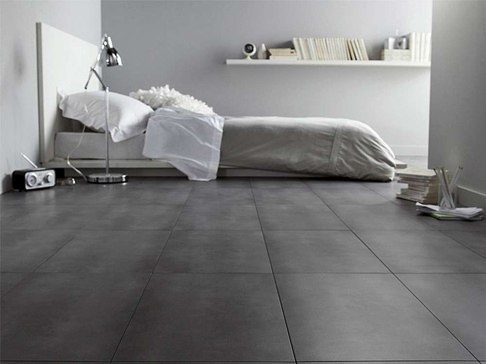 Темно-серый пол в интерьере спальни в стиле минимализм